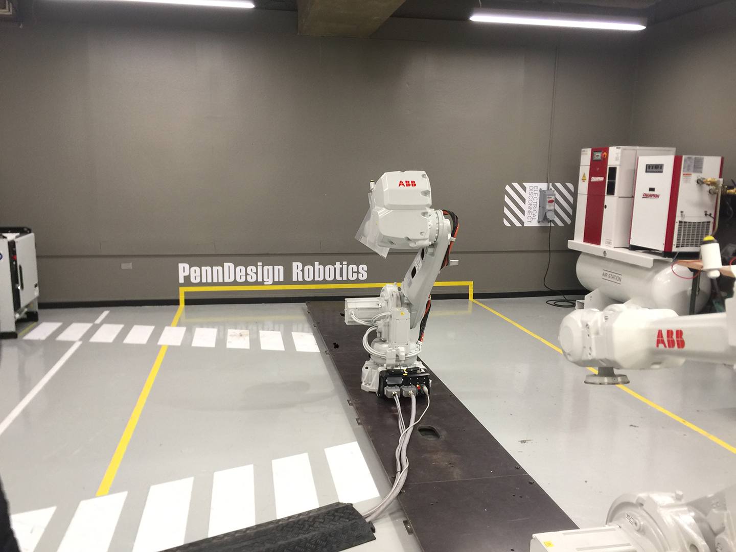 Robot stands in place at University of Pennsylvania's PennDesign Robotics Laboratory