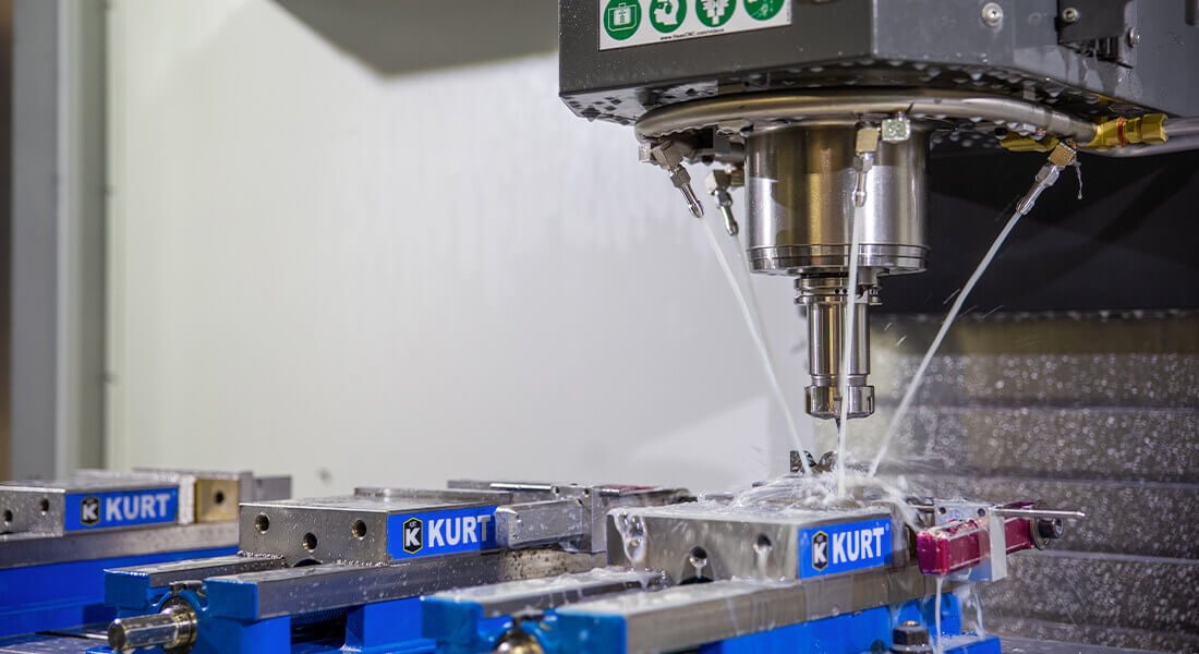 Kurt machine parts being washed by robotic automation