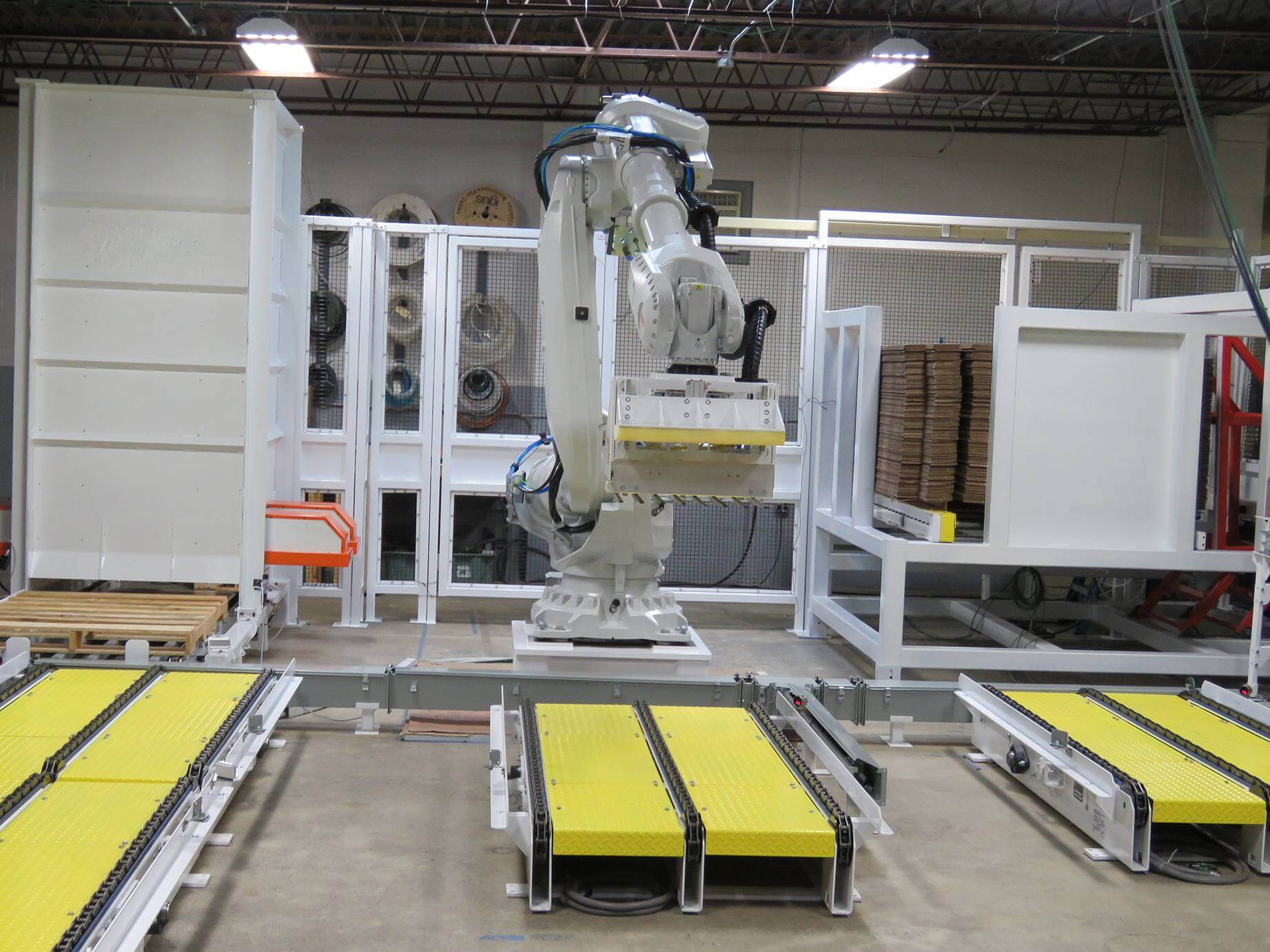 Palleting system robot arm at work